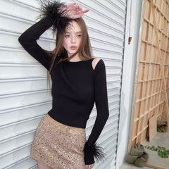 Off shoulder long sleeved feather knit sweater