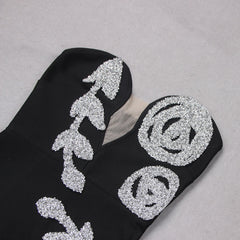 Elegant Black Dress with Shimmering Silver Details